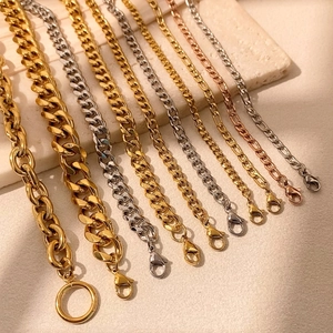 Detail showing gold, silver and rose gold curb and figaro chains with lobster clasps