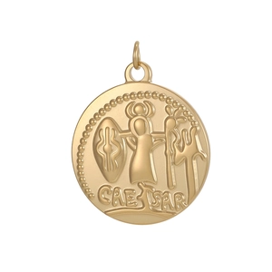 Macro detail of golden stainless steel coin pendant with embossed Caesar figure