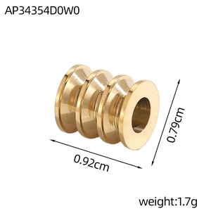 Macro view of gold stainless steel heart bead with dimensions 0.92cm and 0.79cm