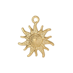 Macro view of a bohemian 18K gold-plated stainless steel sunburst pendant for jewelry