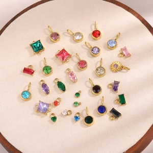 Assorted colorful zircon stone pendants in gold plated settings for jewelry making