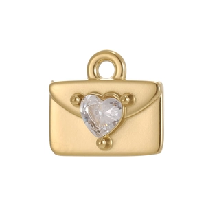 Detail of gold envelope pendant with sparkling heart-shaped zircon and metallic finish