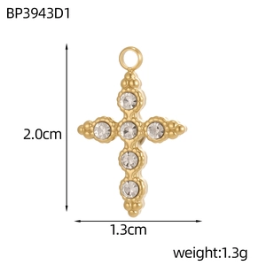 Detailed view of gold-plated cross pendant with dimensions and cubic zirconia inlay