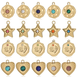 Gold plated stainless steel coin charms featuring star, heart, and handprint designs