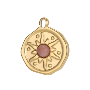 Golden sunburst coin pendant featuring a round pink crystal in a vintage style