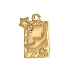Macro detail of gold rectangle pendant featuring celestial moon and star relief design