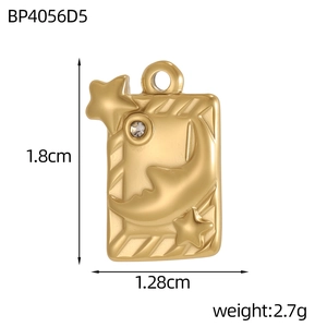 Gold rectangular stainless steel pendant with moon, star relief and a small rhinestone
