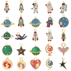 Collection of 25 enamel space themed charms including astronauts and rockets for DIY jewelry