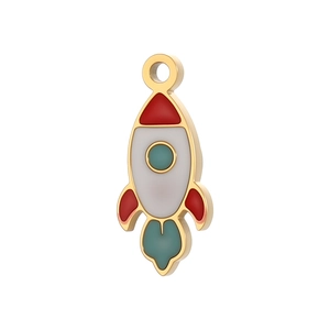 Detailed macro view of a colorful rocket charm with golden plating for DIY jewelry