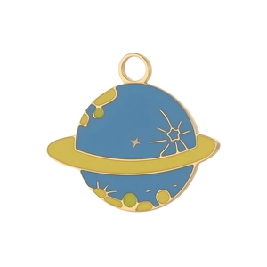 Detail view of golden Saturn planet charm with blue and yellow enamel for DIY jewelry