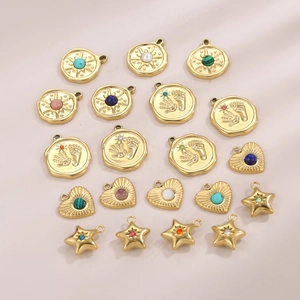 Assorted gold stainless steel evil eye pendants with star heart and sunburst designs