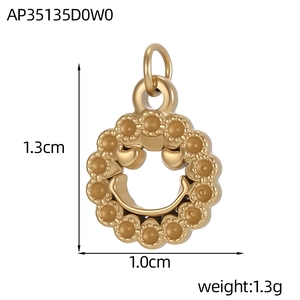 Detailed macro view of a golden stainless steel sunflower smiley face pendant with dimensions
