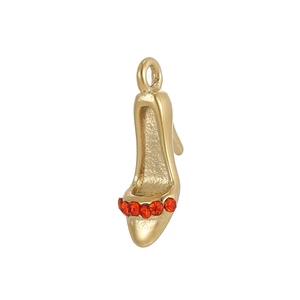 Elegant gold-plated high heel shoe pendant with orange zircons on a white background