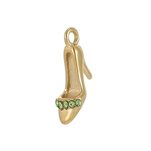 Detailed view of a gold-plated high heel charm with green crystals and top hanging ring