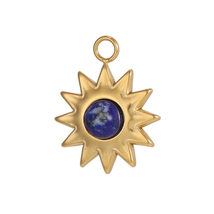 Detailed view of sunburst gold pendant featuring an inlaid round blue natural stone