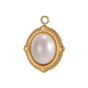 Detailed view of vintage gold sunflower pendant with oval stone and handmade texture