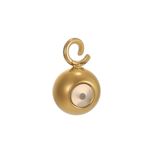 Close-up of golden spherical pendant with inlaid stone and lobster clasp for DIY jewelry