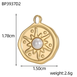 Macro view of gold stainless steel pendant with pearl inlay and detailed size measurements