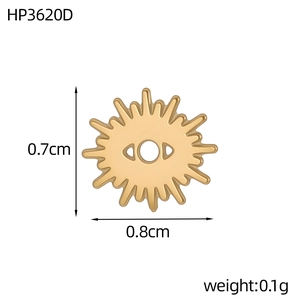 Macro shot of 0.7cm gold sunburst evil eye pendant charm in stainless steel