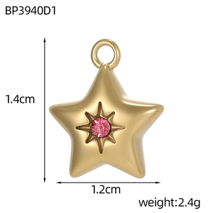 Detailed view of a gold star pendant featuring a pink zircon with 1.4cm size specs