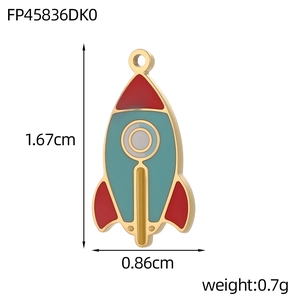 Macro view of a rocket enamel pendant with dimensions 1.67cm by 0.86cm for DIY jewelry
