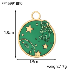 Detail showing green enamel astronaut pendant dimensions of 1.8cm by 1.5cm for DIY jewelry