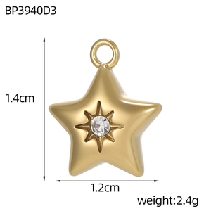 Detailed view of a gold star pendant with center zircon and size measurements