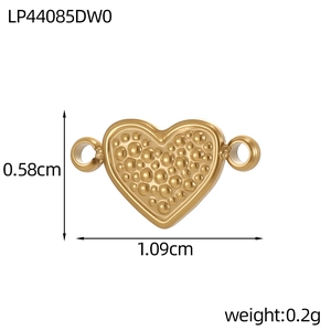 Macro view of gold heart jewelry connector with 3D bubble texture and measurement specs