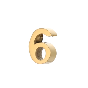 Detailed macro view of gold-plated stainless steel 3D number 6 charm for DIY jewelry making