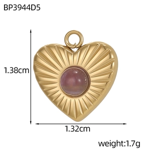 Golden heart pendant with purple gemstone and etched rays showing 1.32cm size dimensions