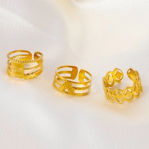 Three-piece gold-plated stainless steel ring set with LOVE lettering and heart patterns