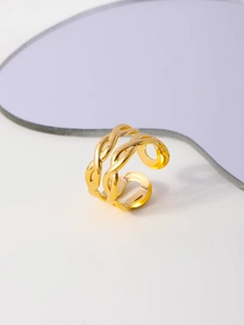 Detail of gold-plated double-layer braided twist open ring with minimalist hollow texture