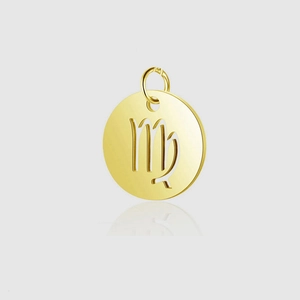 Detailed macro shot of golden stainless steel hollow Virgo constellation round pendant