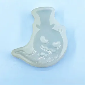 Detail view of translucent silicone ghost mold with hat and bowtie for Halloween DIY