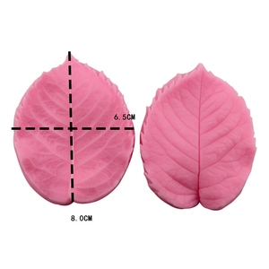 Detail view of pink leaf silicone fondant mold showing 8.0cm by 6.5cm dimensions