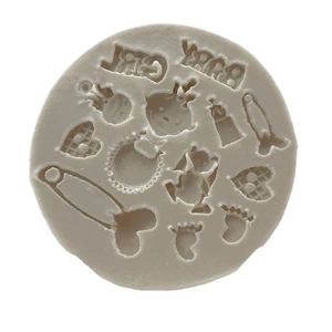 Silicone baby shower fondant mold featuring footprints, bottles, and Baby Girl text patterns