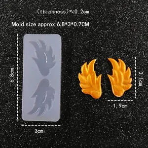 Silicone angel wing mold for DIY jewelry and fondant with golden resin wing samples