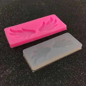 Silicone angel wing molds for DIY jewelry crafts and chocolate baking in pink and white
