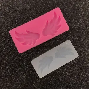 Macro shot of wing-shaped silicone mold texture for fondant and DIY crafts