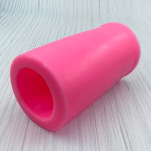 Close-up of pink 3D baby bottle silicone mold for cake fondant and DIY crafts