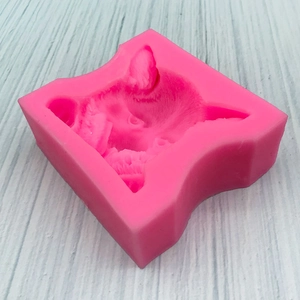 Pink silicone dog head mold with detailed hair texture for 3D cake and candle making