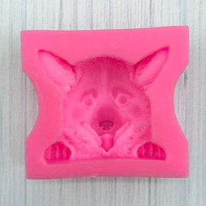 Macro detail of dog head silicone mold for 3D Corgi cake mousse and chocolate making