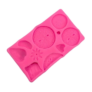 Pink silicone fruit mold set featuring strawberry orange and kiwi shapes for DIY cake decor