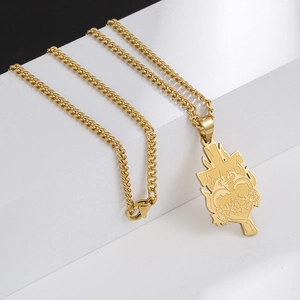 Collana in acciaio inossidabile dorato con ciondolo a croce e cuore sacro su catena cubana
