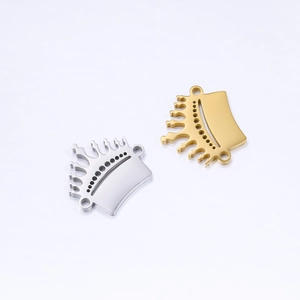 Detailed view of silver and gold stainless steel crown pendants for DIY jewelry design