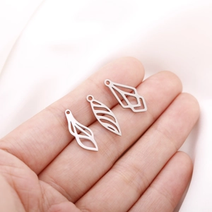 Three pieces of silver hollow leaf and geometric pendants made of stainless steel