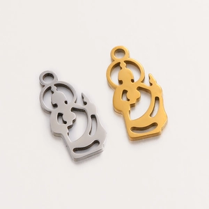 Detail showing two hollow Buddha silhouette charms in gold and silver stainless steel