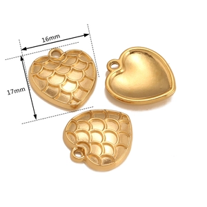 Golden heart-shaped pendant with dragon scale texture for DIY jewelry making