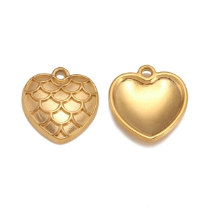 Detailed view of heart-shaped gold pendants with fish scale texture for DIY jewelry