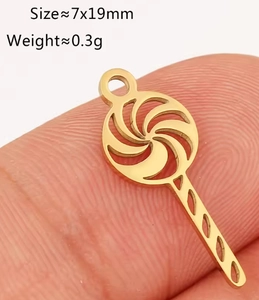 Detailed macro view of lollipop-shaped gold-plated stainless steel charm size 7x19mm